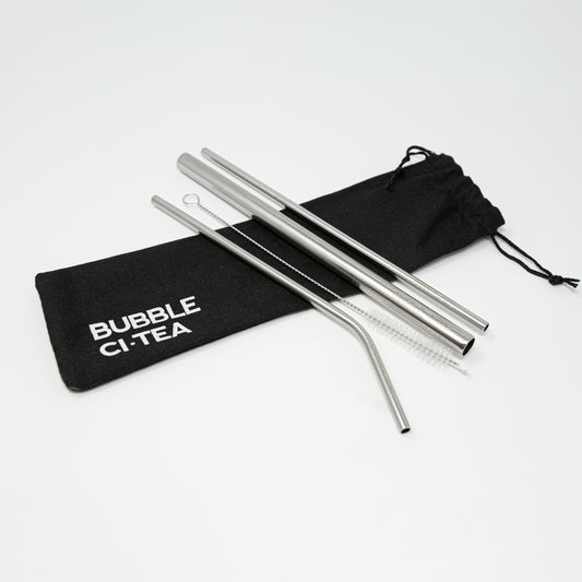 Picture of a pack of stainless steel straws over a black cotton bag with bubble citea logo.